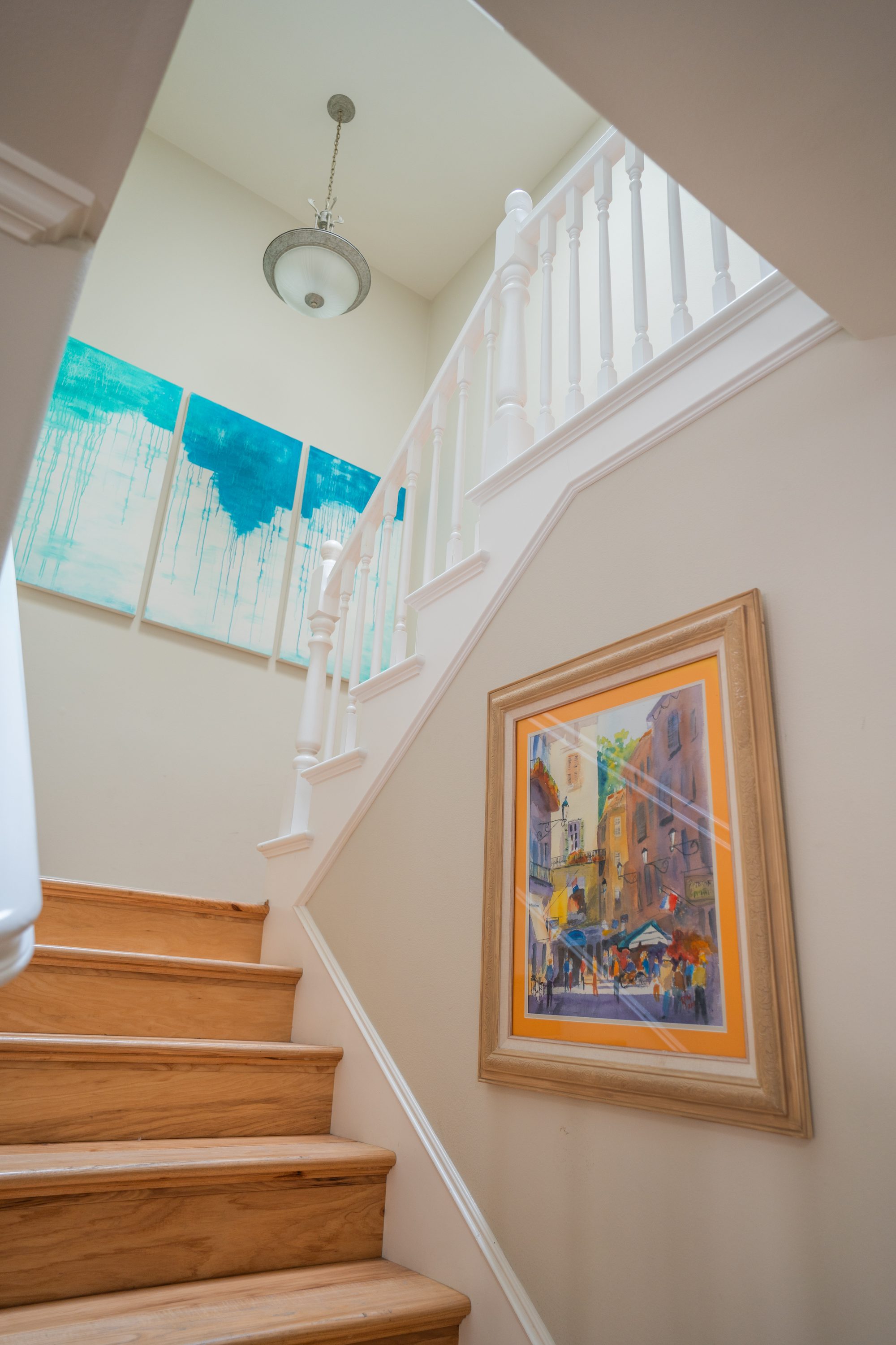 Bright staircase with skylight connecting the home's two levels